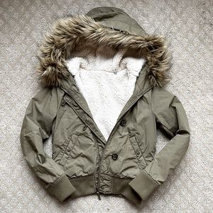 Shearling lined bomber jacket with fur hood